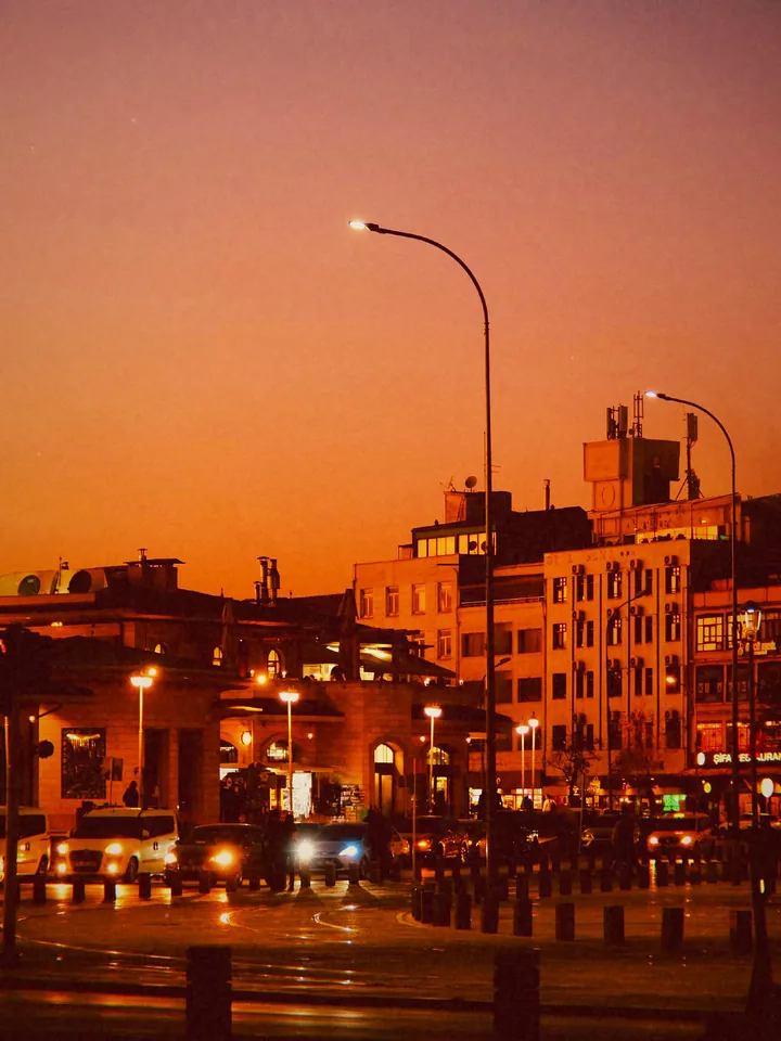 A waterfront street with lamp posts at sunset — 2010 · Square Feed